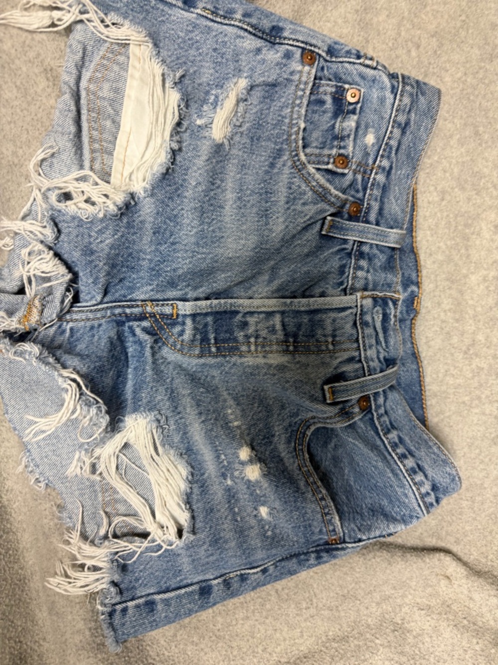 Distressed Light Blue Denim Cutoff Shorts